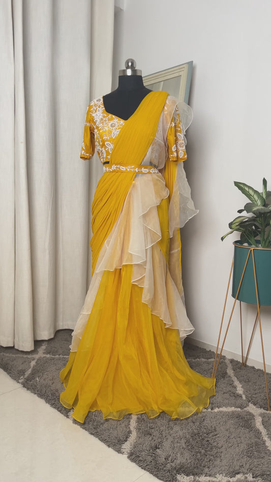 Fusion of mustard and ivory drape saree